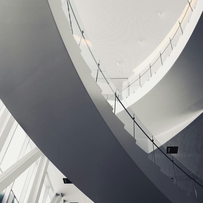 a curved staircase in a building