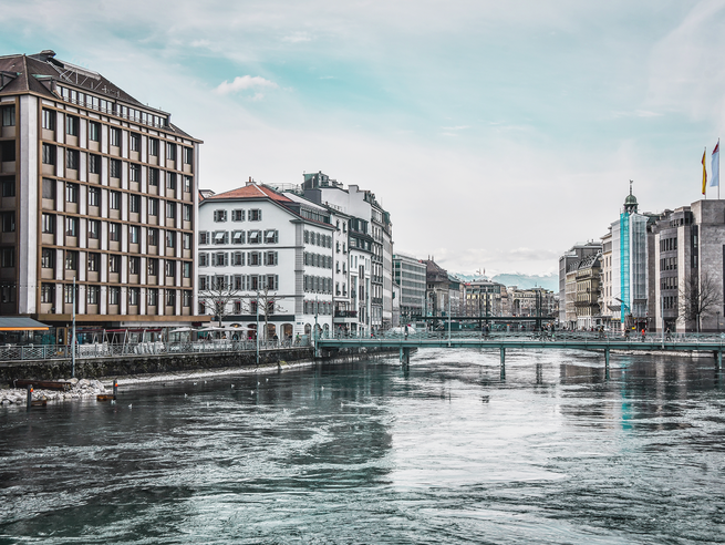 a river with a bridge over it