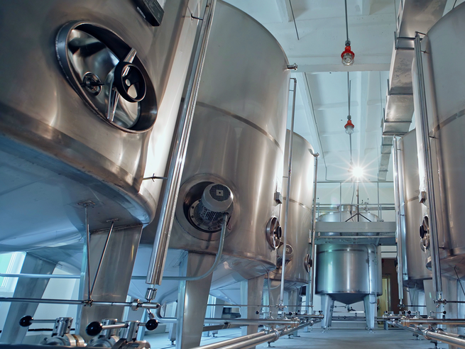 a large metal tanks in a factory
