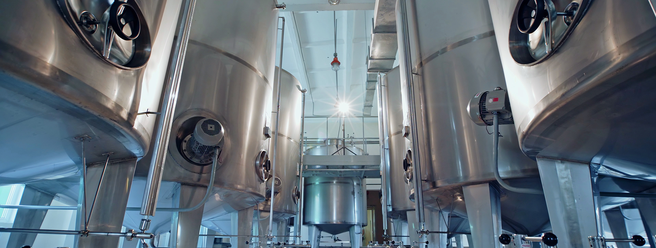 a large metal tanks in a factory