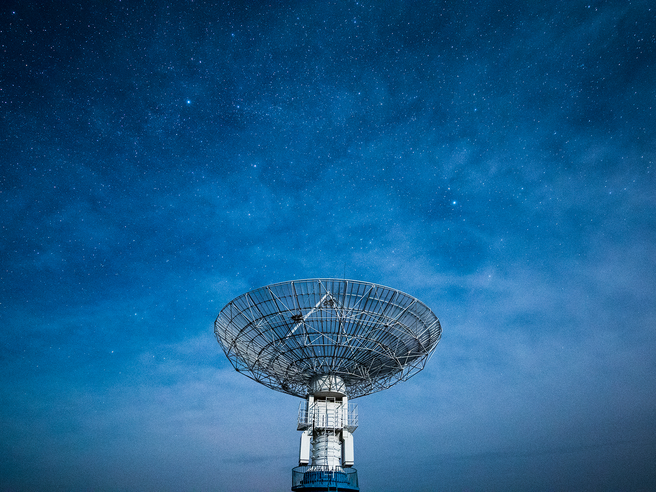 a satellite dish on a tower